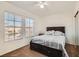 Comfortable bedroom featuring ample natural light and plush carpet at 525 Sunnys Halo Ct, Henderson, NV 89015
