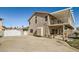 View of the side of the house that includes the balcony, patio, and driveway at 525 Sunnys Halo Ct, Henderson, NV 89015