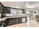 Functional kitchen featuring tile floors, stainless steel appliances, and plenty of counter space at 525 Sunnys Halo Ct, Henderson, NV 89015