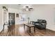 Inviting living room with hardwood floors, natural light, and neutral color palette at 525 Sunnys Halo Ct, Henderson, NV 89015