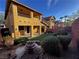 View of a backyard and covered patio, showing nice hardscape and landscaping at 5361 Candlespice Way, Las Vegas, NV 89135