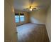 Expansive bedroom with plush carpeting, neutral walls, and plenty of natural light at 5361 Candlespice Way, Las Vegas, NV 89135