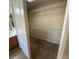 Walk-in closet with carpeted floor and metal shelving at 5361 Candlespice Way, Las Vegas, NV 89135