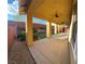 Spacious covered patio overlooking a beautifully landscaped backyard with stone accents at 5361 Candlespice Way, Las Vegas, NV 89135