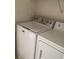 Laundry room with a washing machine and a dryer, offering convenience and functionality at 5710 E Tropicana Ave # 2003, Las Vegas, NV 89122
