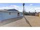 The backyard features desert landscaping and a privacy fence at 6121 Edgewood Cir, Las Vegas, NV 89107