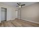 Bright bedroom features updated flooring, neutral paint, and closet with sliding doors at 6121 Edgewood Cir, Las Vegas, NV 89107