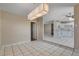 Dining room adjacent to kitchen featuring tile floors and an open floor plan at 6121 Edgewood Cir, Las Vegas, NV 89107