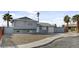 Exterior image showing a two-story home with a garage, and gravel landscaping at 6121 Edgewood Cir, Las Vegas, NV 89107