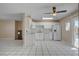 Open kitchen and dining area featuring tile floors and stainless steel appliances at 6121 Edgewood Cir, Las Vegas, NV 89107