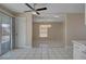 Open kitchen and dining area featuring tile floors and access to the backyard at 6121 Edgewood Cir, Las Vegas, NV 89107
