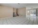 Bright living room with tile flooring and staircase at 6121 Edgewood Cir, Las Vegas, NV 89107