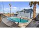 A backyard featuring a refreshing in-ground pool and well-maintained landscaping at 6121 Edgewood Cir, Las Vegas, NV 89107