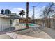The backyard features desert landscaping and an in-ground pool at 6121 Edgewood Cir, Las Vegas, NV 89107