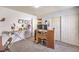 Bright bedroom featuring carpeted floors, ample closet space, and versatile design at 6472 Chebec St, North Las Vegas, NV 89084