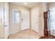 The entryway has tiled floors and a grandfather clock at 6472 Chebec St, North Las Vegas, NV 89084