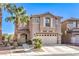 Beautiful two-story home with desert landscaping and a two-car garage at 6472 Chebec St, North Las Vegas, NV 89084