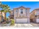 Inviting two-story home featuring desert landscaping and a spacious two-car garage at 6472 Chebec St, North Las Vegas, NV 89084