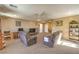 Bright and airy living space with plush seating, providing an ideal area for entertaining or relaxation at 6472 Chebec St, North Las Vegas, NV 89084