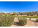 Picturesque neighborhood with manicured lawns, mature trees, and well-maintained homes at 6472 Chebec St, North Las Vegas, NV 89084