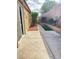 Charming backyard with manicured landscaping and concrete patio at 7317 Caballo Range Ave, Las Vegas, NV 89179