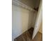 Open closet with shelving, presenting neat storage within a carpeted interior space at 7317 Caballo Range Ave, Las Vegas, NV 89179