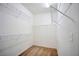Walk-in closet featuring carpeted floors and wire shelving for optimal storage and organization at 7317 Caballo Range Ave, Las Vegas, NV 89179
