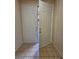 Welcoming entryway featuring double doors and neutral ceramic tile flooring at 7317 Caballo Range Ave, Las Vegas, NV 89179