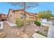 Charming single-Gathering home with desert landscaping and a well-maintained lawn at 7317 Caballo Range Ave, Las Vegas, NV 89179