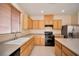 Well-equipped kitchen with stainless steel appliances and ample cabinetry at 7317 Caballo Range Ave, Las Vegas, NV 89179