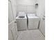 Practical laundry room equipped with a modern washer and dryer set for efficient chores at 7317 Caballo Range Ave, Las Vegas, NV 89179