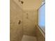 Shower with an adjustable shower head and a built in soap holder at 7317 Caballo Range Ave, Las Vegas, NV 89179