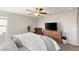 Inviting bedroom with a ceiling fan, comfortable furniture, and ample natural light at 7717 Rosebark Cliffs St, North Las Vegas, NV 89084