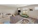 Spacious playroom area with multiple seating options, soft play features, and natural light at 7717 Rosebark Cliffs St, North Las Vegas, NV 89084