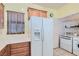 Laundry area with washer, dryer, and window at 7921 Fantail Dr, North Las Vegas, NV 89084