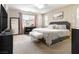 Bright bedroom with large window, soft decor, and a comfortable bed, creating a serene atmosphere at 8248 Southern Cross Ave, Las Vegas, NV 89131