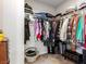 Walk-in closet with ample hanging space, shelving, and a storage trunk at 8248 Southern Cross Ave, Las Vegas, NV 89131