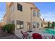 The beautiful backyard features a private pool and patio area perfect for outdoor living at 8432 Squaw Valley Ave, Las Vegas, NV 89128