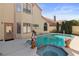Beautiful backyard showcasing a serene pool, spa, and well-maintained landscaping for outdoor enjoyment at 8432 Squaw Valley Ave, Las Vegas, NV 89128