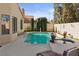 Inviting backyard pool and spa surrounded by well-manicured landscaping, offering a private retreat at 8432 Squaw Valley Ave, Las Vegas, NV 89128