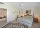 Bright bedroom with large bed and natural light at 8432 Squaw Valley Ave, Las Vegas, NV 89128