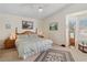 Bright bedroom with high ceilings and large windows providing natural light at 8432 Squaw Valley Ave, Las Vegas, NV 89128