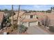 Charming two-story home featuring a tile roof, desert landscaping, and a spacious two-car garage at 8432 Squaw Valley Ave, Las Vegas, NV 89128