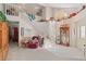 Spacious foyer with a staircase, chandelier, and decorative display shelf at 8432 Squaw Valley Ave, Las Vegas, NV 89128