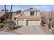 Charming two-story home with a three-car garage and well-maintained landscaping at 8432 Squaw Valley Ave, Las Vegas, NV 89128