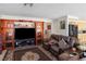 Open living space with large TV and comfortable seating at 8432 Squaw Valley Ave, Las Vegas, NV 89128
