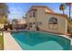 Inviting backyard pool with deck offers a private retreat for relaxation and entertainment at 8432 Squaw Valley Ave, Las Vegas, NV 89128