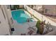 Aerial view of the backyard pool and patio area is perfect for outdoor entertaining and relaxation at 8432 Squaw Valley Ave, Las Vegas, NV 89128