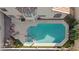 Aerial view of backyard pool with jacuzzi and lounge area, ideal for relaxation and recreation at 8432 Squaw Valley Ave, Las Vegas, NV 89128