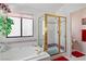 Shower with gold frame, decorative tile, and a large window bringing in natural light at 8432 Squaw Valley Ave, Las Vegas, NV 89128